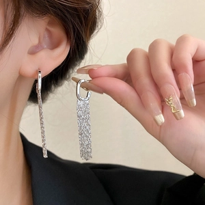Elegant silver G-shape fringe tassel earrings featuring a long cascading metal design