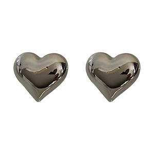 Polished silver heart-shaped stud earrings in minimalist 3D design on white background
