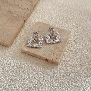 Minimalist silver geometric hammered earrings with irregular square texture on stone base