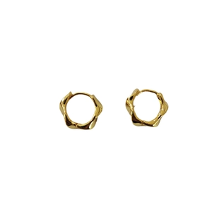 Minimalist twisted gold hoop earrings with polished wavy metal design for women