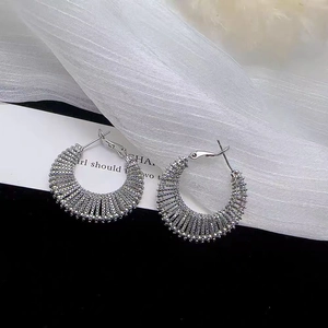 S925 silver needle woven texture metal hoop earrings with a hollow minimalist design