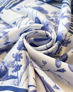 Detailed view of silky satin scarf with elegant blue and white floral porcelain pattern