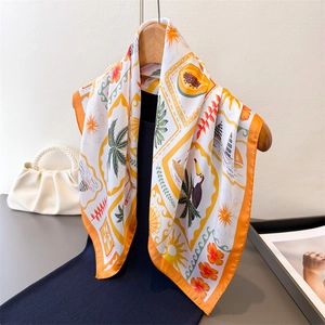 Silky square scarf with tropical palm and floral prints in bright orange and white
