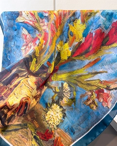 Detail of artistic sunflower oil painting print on silky scarf with navy blue hem