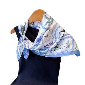 Tropical nautical print silk scarf with palm trees and seagulls on navy vest