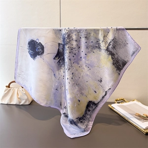 Artistic ballet print silk scarf in soft purple with delicate rolled edges hanging display