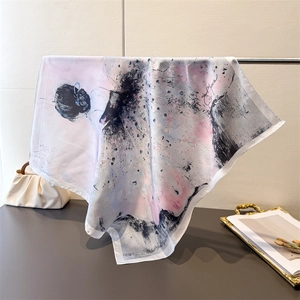 Detail of silk scarf with artistic ballet dancer ink print and fine stitched edges