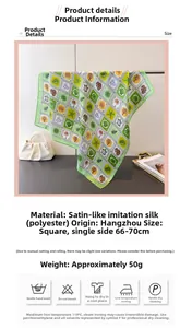 Detailed view of green tropical plant print silk-like scarf with material specifications