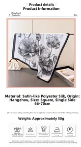 Close-up of elegant black and white floral print silk scarf with 70cm square dimensions