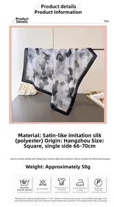 Detail view of monochrome camouflage satin scarf showing 70cm square dimensions and texture