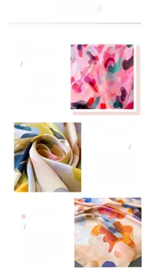 Detail of multi-color printed silk scarf showing high-quality stitching and smooth fabric