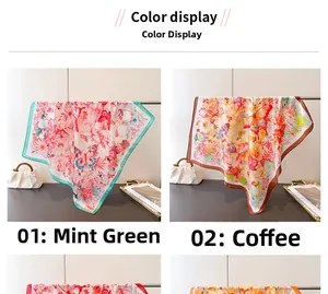 Detail of floral butterfly printed silk scarves in mint green and brown color options