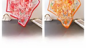 Detail showing floral butterfly print scarves in red and warm orange silk-like fabric