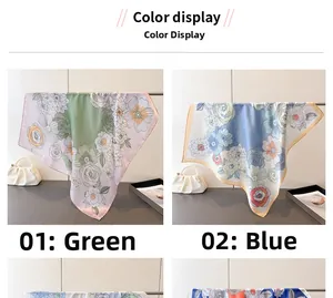 Detail view of floral print silk scarves in green and blue color options