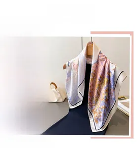 Detailed macro view of impressionist floral oil painting pattern on premium silk scarf