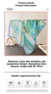 Detail of artistic floral impressionist silk scarf featuring smooth satin texture and print
