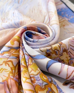 Macro shot of silk scarf fabric showing oily painting flower print and smooth texture