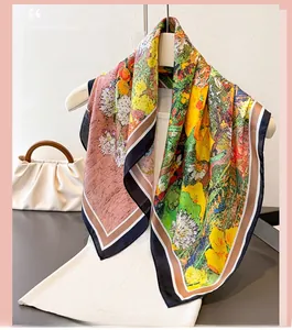 Detailed view of floral silk scarf with oil painting pattern draped on a hanger