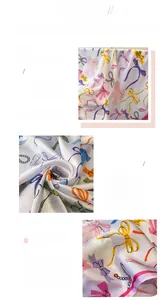 Detailed view of bow knot silk-like scarf showing premium printed texture and stitched edges