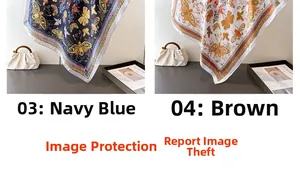 Detailed view of French floral butterfly silk scarves in navy blue and brown colors