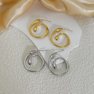 Minimalist 18K gold and silver plated spiral geometric earrings on white stone