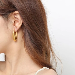 Golden 18K gold-plated U-shaped chunky teardrop earrings with a high-polished finish