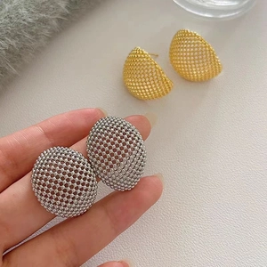 Minimalist geometric hollow mesh C-shaped earrings in silver and gold finishes
