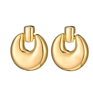 Modern minimalist thick golden hoop earrings with a polished vintage geometric design
