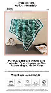 Detail view of green geometric satin scarf with product specifications and washing guide