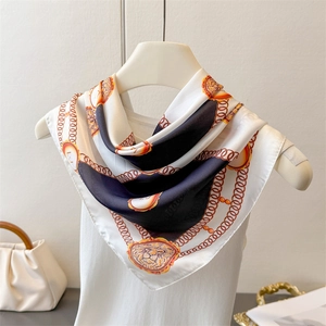 Checkered silk-feel scarf featuring a vintage lion head and chain print on white and navy