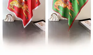 Detail view of equestrian silk-like square scarves in red and green with horse prints