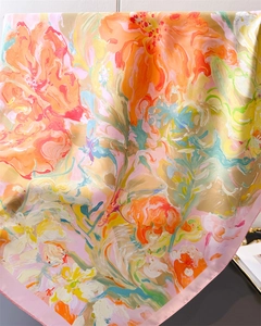 Close-up of artistic silk scarf with oil painting abstract flower print and satin texture