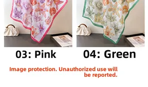 Detailed view of floral silk scarves in pink and green tulip prints with satin texture