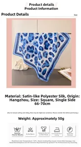 Detail view of blue leopard print satin square scarf showing its 70cm size and silky texture