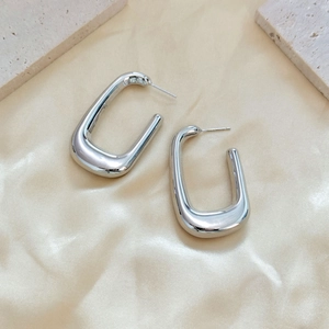 Minimalist silver hollow rectangle U-shaped hoop earrings with polished metallic finish