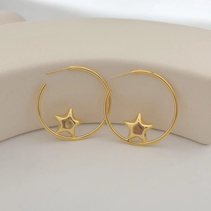 Modern gold star hoop earrings with high-polish metallic finish for stylish women