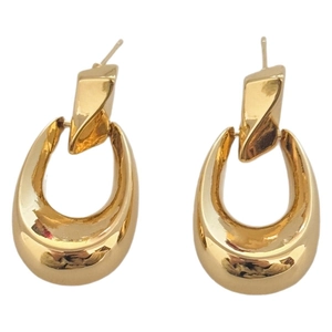 Boucles d'oreilles pendantes géométriques torsadées dorées au design minimaliste