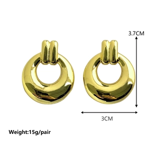 Polished gold geometric chunky hoop earrings measuring 3.7cm height and 3cm width