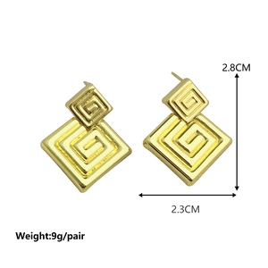 Golden geometric earrings with labyrinth pattern design measuring 2.8cm in height