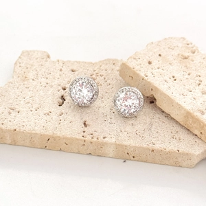 Classic round cubic zirconia stud earrings with silver-toned prong setting on stones