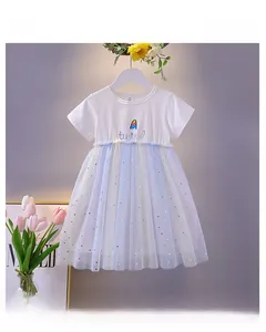 Detail of girls princess dress with rainbow mesh skirt and silver star sequins