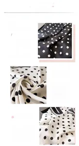 Detailed view of the elegant polka dot print and fine hemmed edges on faux silk scarf