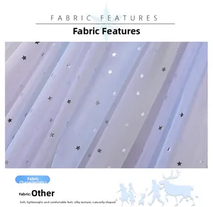 Detail of light blue mesh fabric with silver stars for children's princess dress