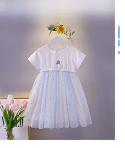 Detail of girls' cotton dress featuring rainbow tulle skirt with silver sequin stars