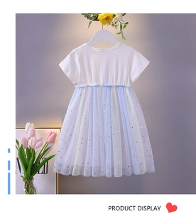 Detail of girls' short-sleeve summer dress with silver star sequins and mesh tutu skirt