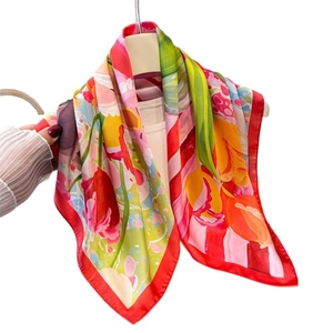 Elegant silk-like square scarf with red tulip floral print and red border finish