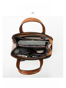 Top view of brown crocodile textured tote bag showing spacious compartments for iPad and daily items