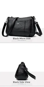 Détail de la texture en cuir noir avec logo kangourou en métal sur le sac à bandoulière