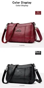 Détail de sacs à main bordeaux et noirs avec texture litchi et logos de marque