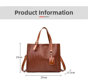 Brown woven tote bag with dimensions 29x25x11.5cm, adjustable strap and square charm